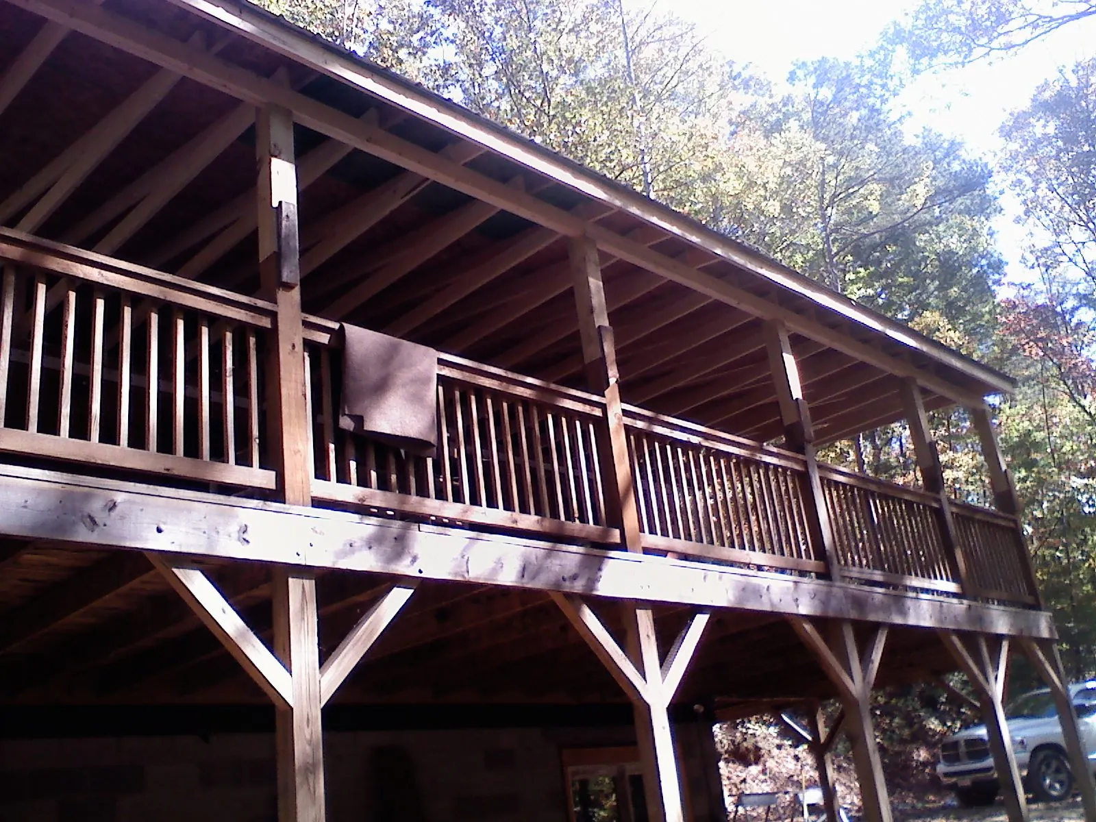 Timber framing under a new elevated porch and deck — Roof Leak Repair in Cuddy by Roofing Brothers